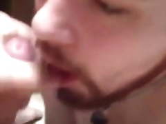 Shooting cum on the twink's face and tongue